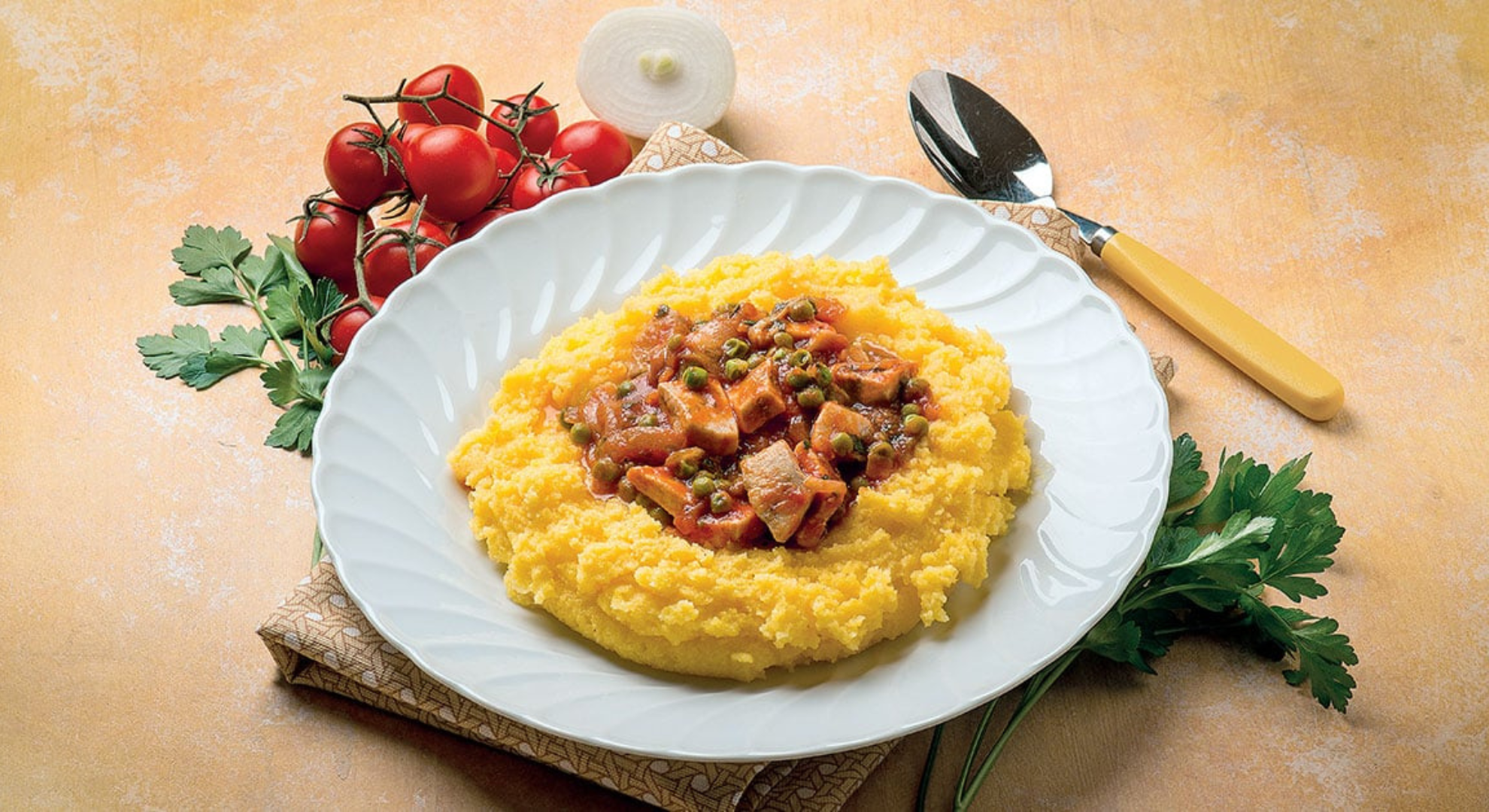 Polenta con pesce spada in umido